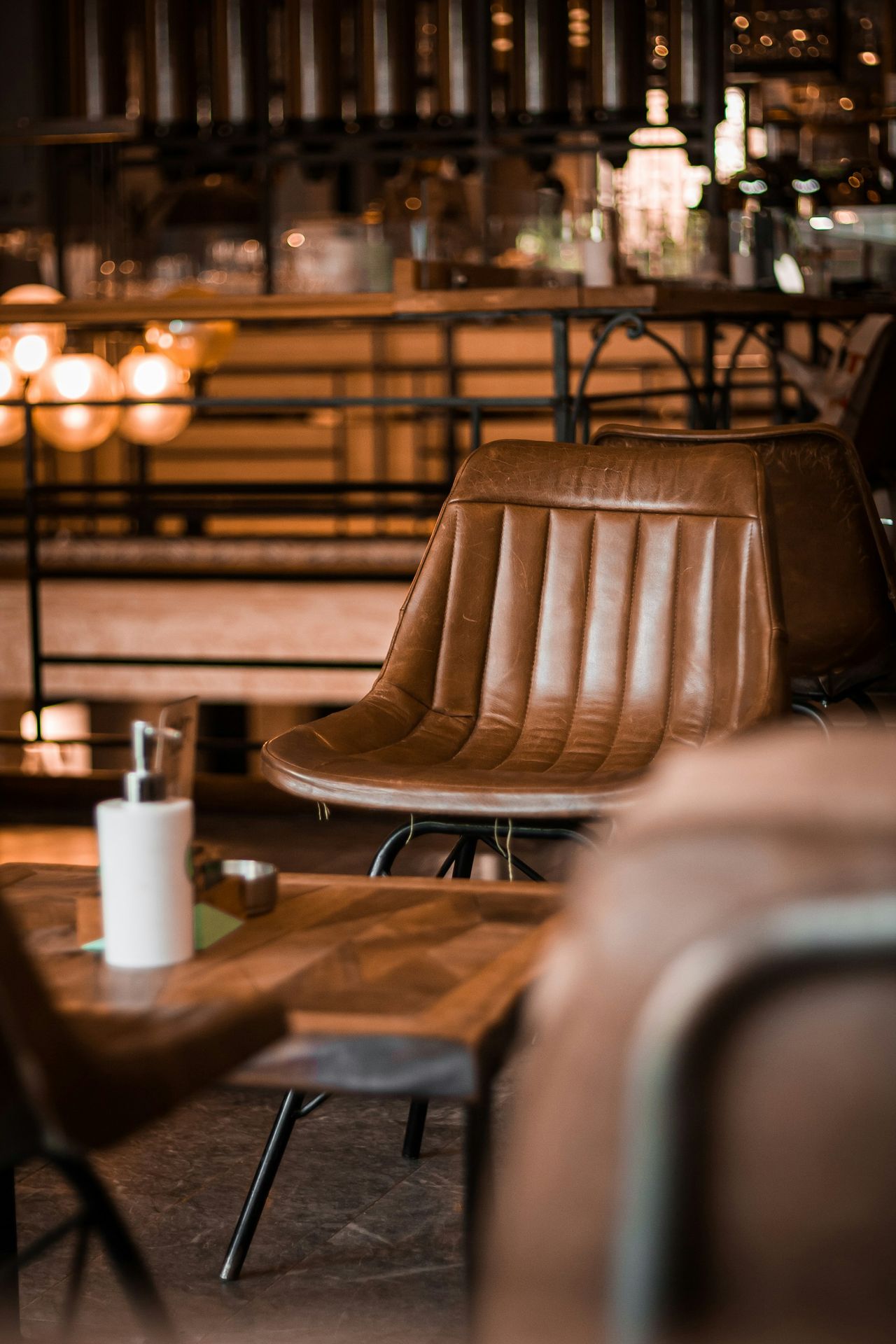 a couple of brown chairs sitting next to each other
